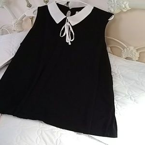 Sleeveless poly top with peter pan collar